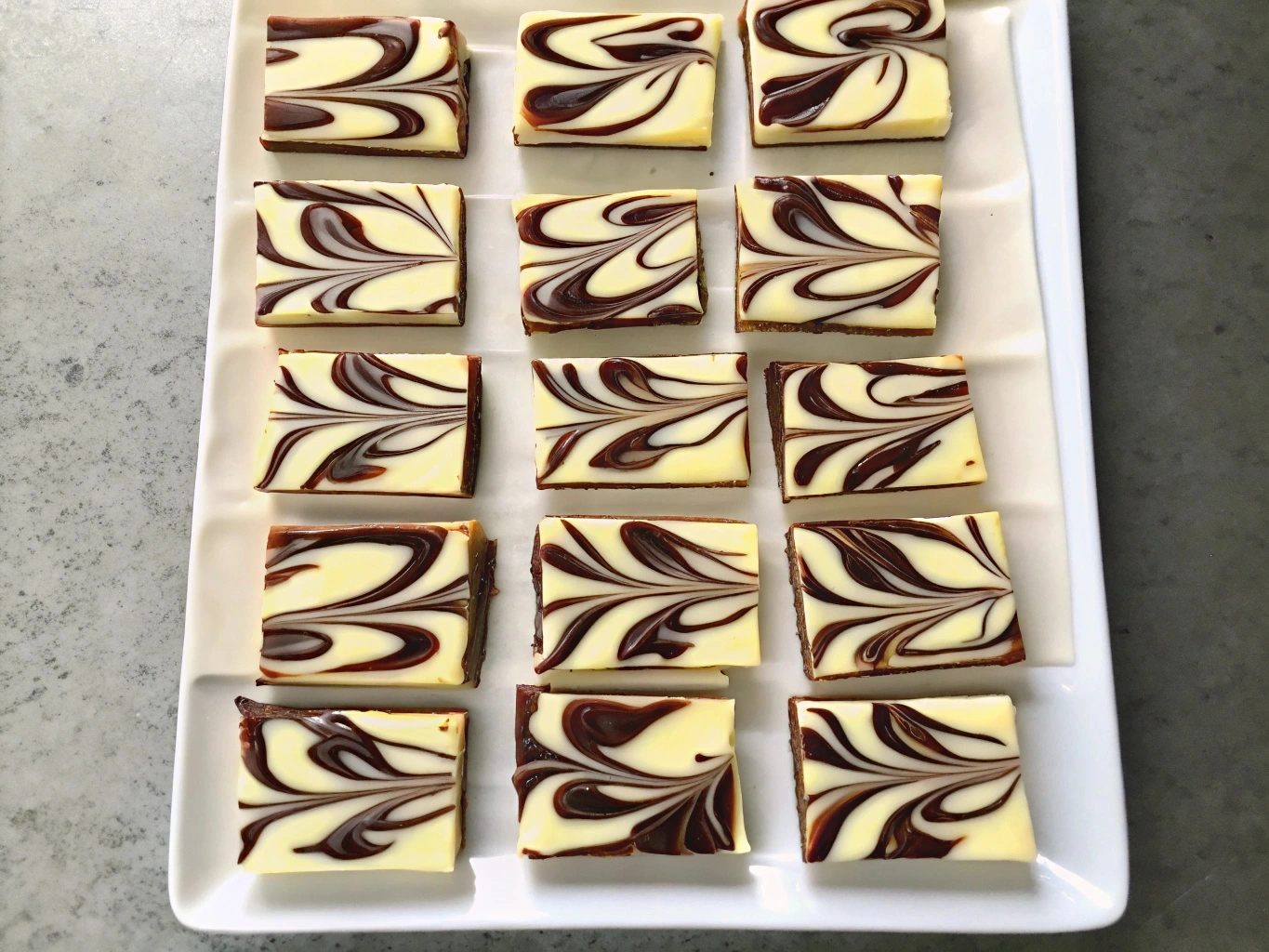 Decadent Nutella Swirled Cheesecake Bars Recipe 3 Nutella Cheesecake Bars, Nutella Dessert Bars, Swirled Cheesecake Bars, Nutella Swirl Cheesecake